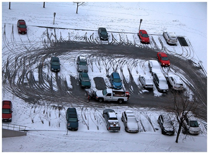 If a parking lot holds 1600 cars